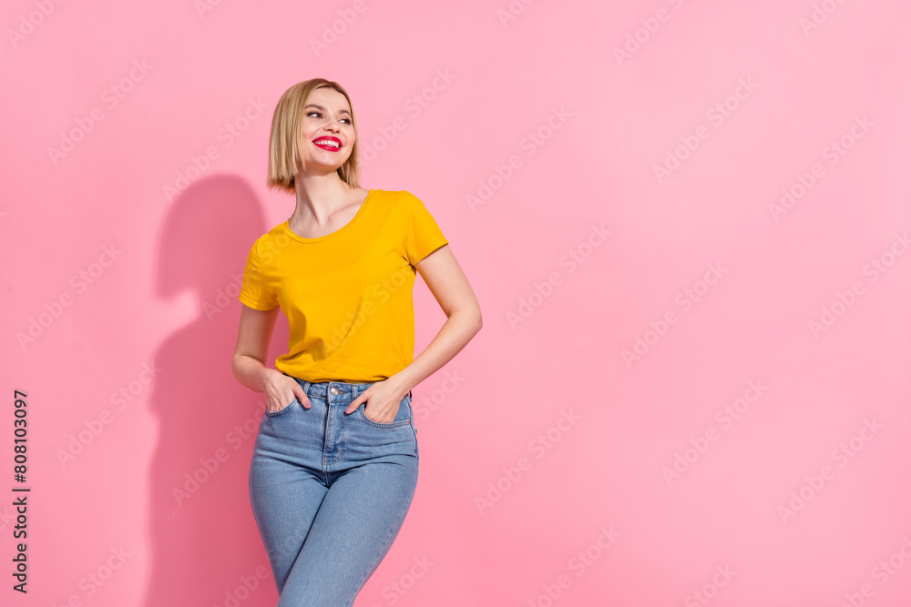Photo of cheerful dreamy lady dressed yellow t-shirt looking empty space isolated pink color background Photo of cheerful dreamy lady dressed yellow t-shirt looking empty space isolated pink color background