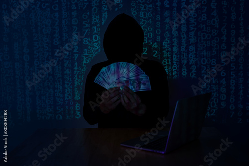 Male hacker use computer laptop hacking a personal data. Cyber threat defense.