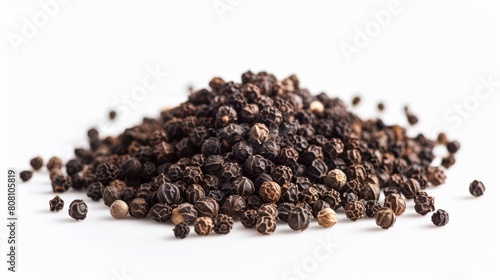 Macro photography of crushed black pepper, displaying the coarse texture and aromatic qualities against a clean, white background