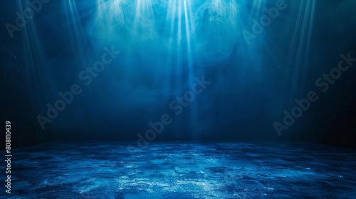 Mystical dark blue spotlight background, perfect for dramatic or theatrical presentations photo