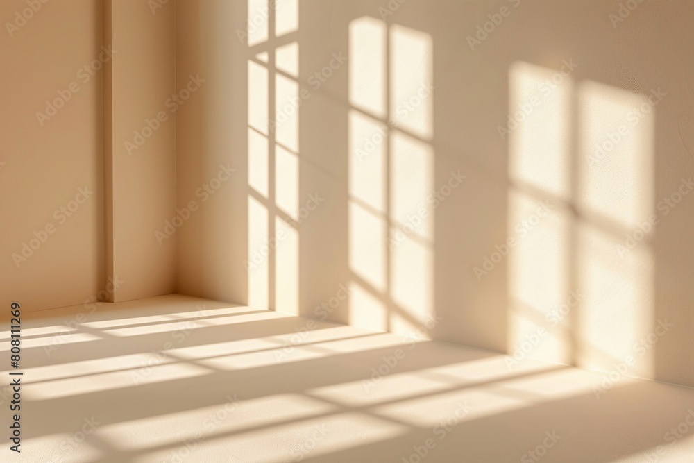 Fototapeta premium Abstract light beige wall, intricate interplays of light and shadow from the window.