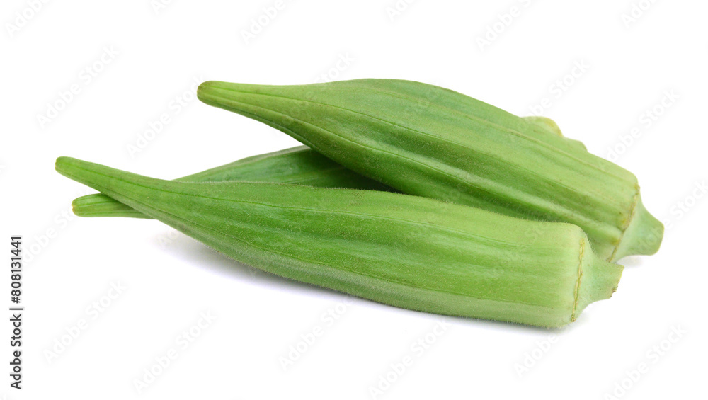 Fresh raw okra isolated on white background, horizontal with copy space Fresh raw okra isolated on white background, horizontal with copy space