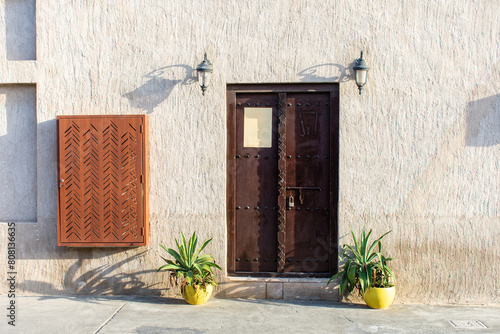 Photography View of old wooden doors on old buildings in Dubai City, UAE.