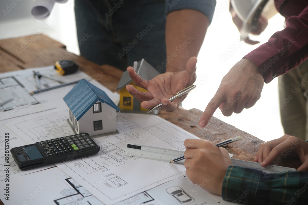 Diverse Team of Specialists Use Laptop on Construction Site. Real Estate Building Project with Engineer Investor and Businessman Checking Area, working on Civil Engineering, Discussing Strategy Plan Diverse Team of Specialists Use Laptop on Construction Site. Real Estate Building Project with Engineer Investor and Businessman Checking Area, working on Civil Engineering, Discussing Strategy Plan