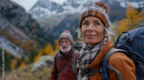 Senior mordern woman and man with backpacks hiking trekking on mountains. Seniors active healthy lifestyle adventure journey vacations. Generative ai