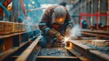 Close-up of a structural welder using advanced welding techniques to secure steel beams at a construction site.