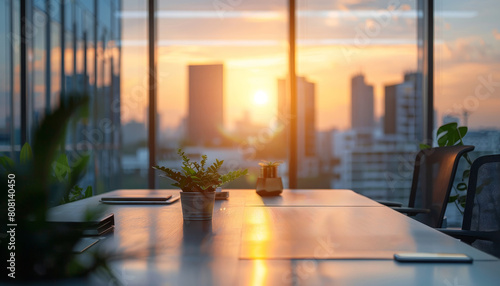 A table with a laptop  a cell phone  and a potted plant in front of a window by AI generated image