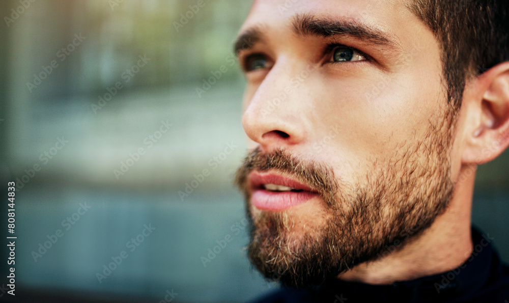 Obraz premium Man, thinking and outdoor for fitness goal with health, sports training and wellness for running exercise. Male runner, thoughtful and face in city with ideas for mindfulness breathing and workout