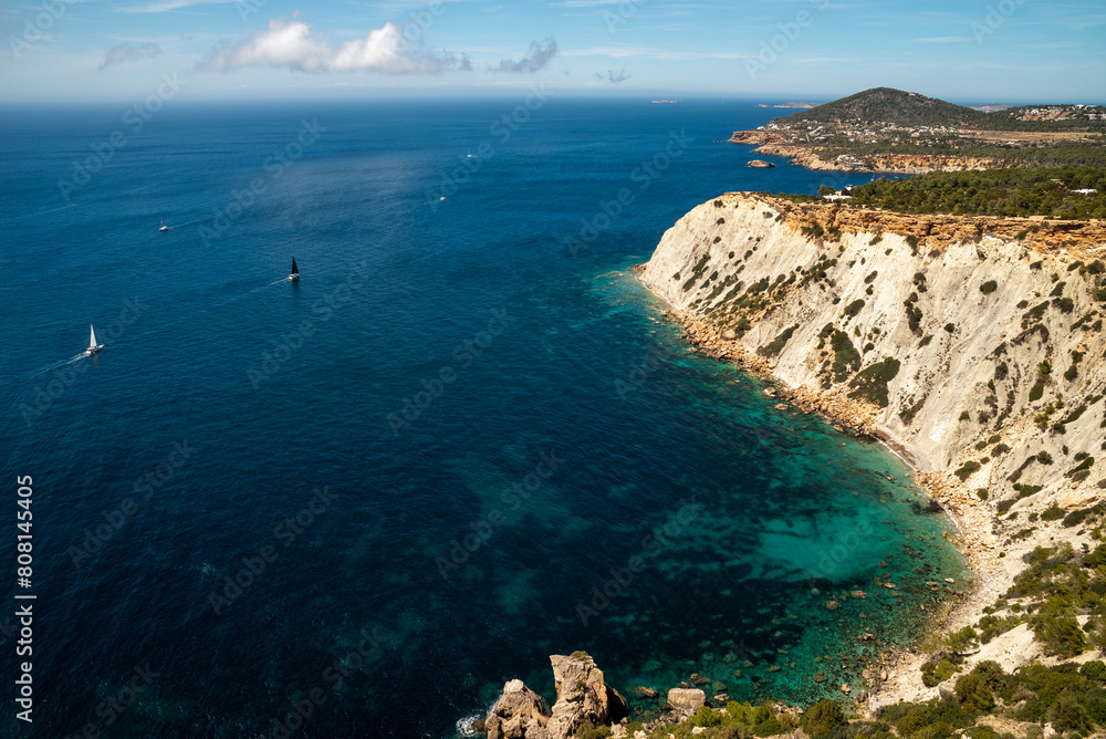 Aerial view of Es Vedra viewpoint cove and cliff at Cap Jueu cape, Sant Josep de Sa Talaia, Ibiza, Balearic Islands, Spain
