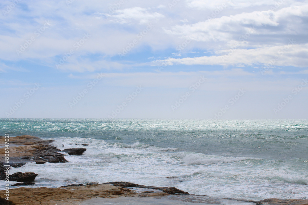 waves on the beach, coast of the Mediterranean Sea in Spain waves on the beach, coast of the Mediterranean Sea in Spain