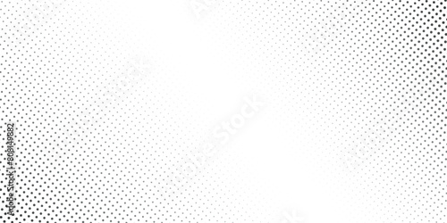 Aged halftone noise gradient texture. Grunge dirty speckles and spots background. White and black faded sand grain wallpaper.
