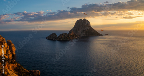 Es Vedra island sunset panoramic view, Sant Josep de Sa Talaia, Ibiza, Balearic Islands, Spain photo