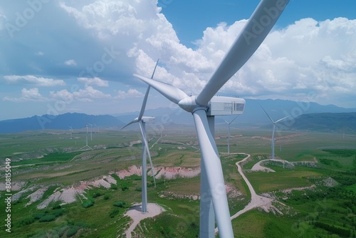 Aerial view of wind turbines in an open field, concept of renewable energy, wind energy, clean energy.