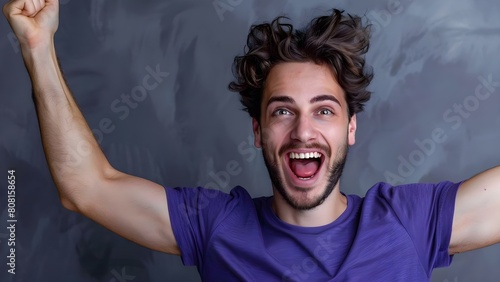 Man with raised arms and open mouth. Concept Excitement, Celebration, Victory, Surprise, Joy photo