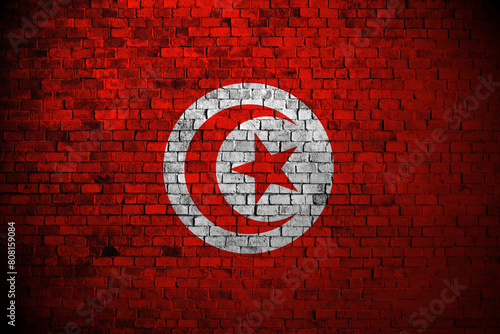 tunisia flag on brick wall photo