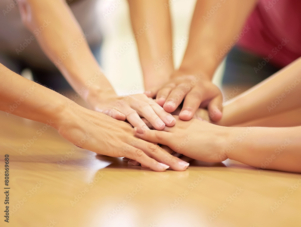Close up of a group of people putting their hands together in a circle. Teamwork and partnership concept. Close up of a group of people putting their hands together in a circle. Teamwork and partnership concept.