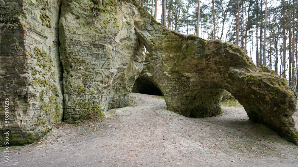 Lielā Ellīte Cave with its massive arches has been created over thousands of years by a spring, visit this ancient holy place and taste the water of the spring!