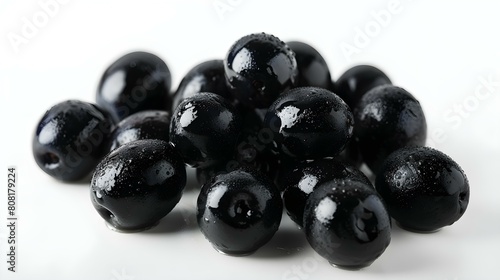 Close up of fresh Black Olives on a white Background
