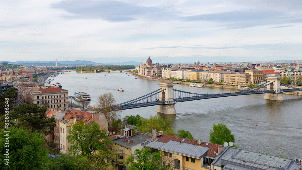 Szechenyi chain bridge main landmark in Budapest crossing Danube river seen from a mount hill