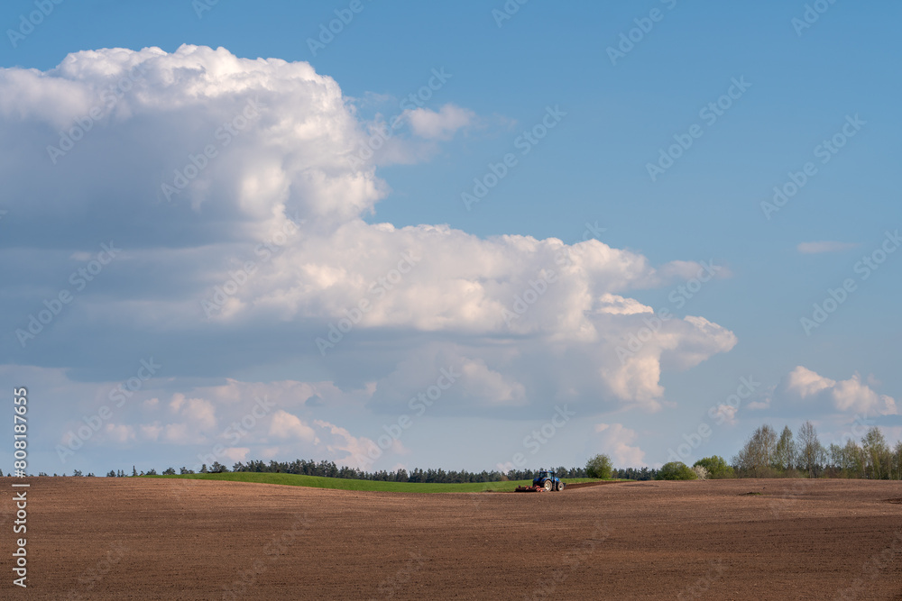 landscape with field and clouds