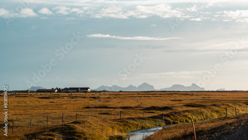 Icelandic panoramas, wide plains with mountains in the distance. Colours, volcanic lands, northern valleys.