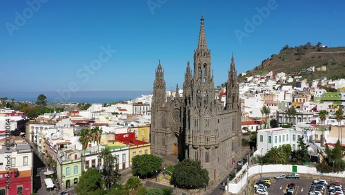 Aerial view of the Parroquia de San Juan Bautista de Arucas church in Arucas town, Gran Canaria, Canary Islands, Spain. Historic Neo-Gothic cathedral in Arucas. photo