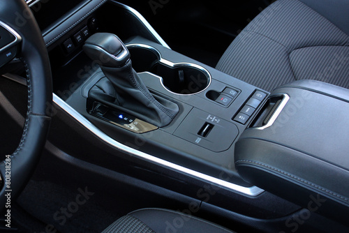 Selector automatic transmission in the interior of a modern expensive car. Automatic Gear Stick close up. Handle of automatic transmission shift stick © Best Auto Photo