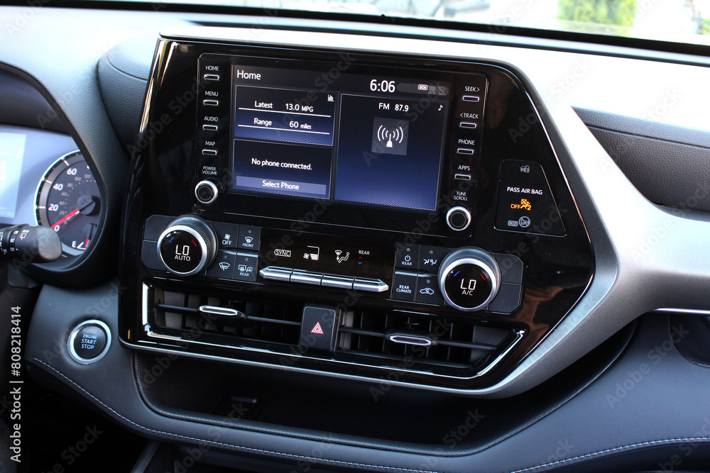 Screen multimedia system on dashboard in a modern SUV. Touch multimedia system on screen car. Panel of a modern car. Screen multimedia system on dashboard in a modern SUV. Touch multimedia system on screen car. Panel of a modern car.
