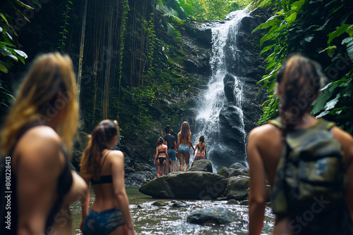 Group hike to a remote forest waterfall