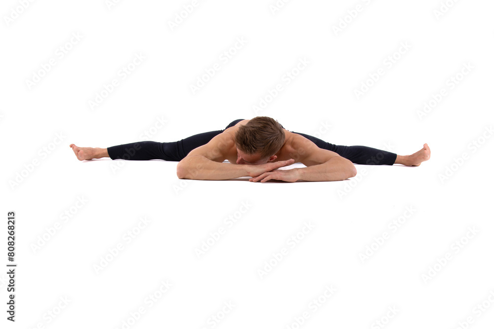 Fitness and meditation. Healthy lifestyle. Young attractive man doing yoga on a white background. Fitness and meditation. Healthy lifestyle. Young attractive man doing yoga on a white background.