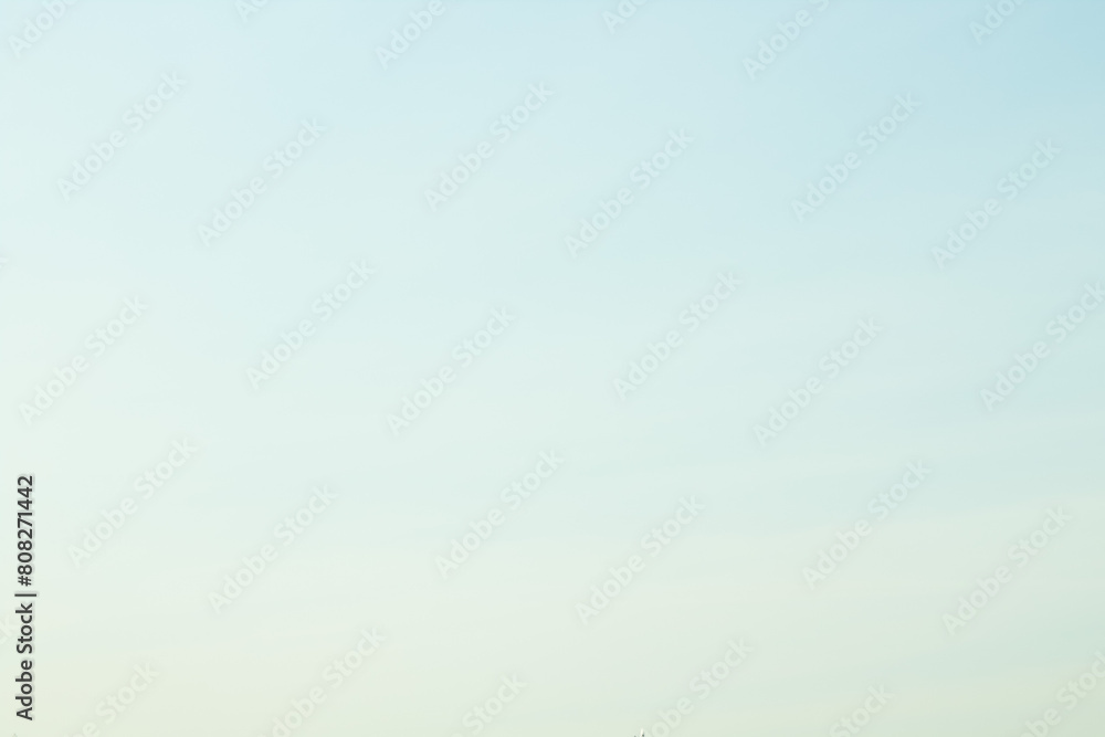 Fototapeta premium Blue, clear sky with clouds and sun.