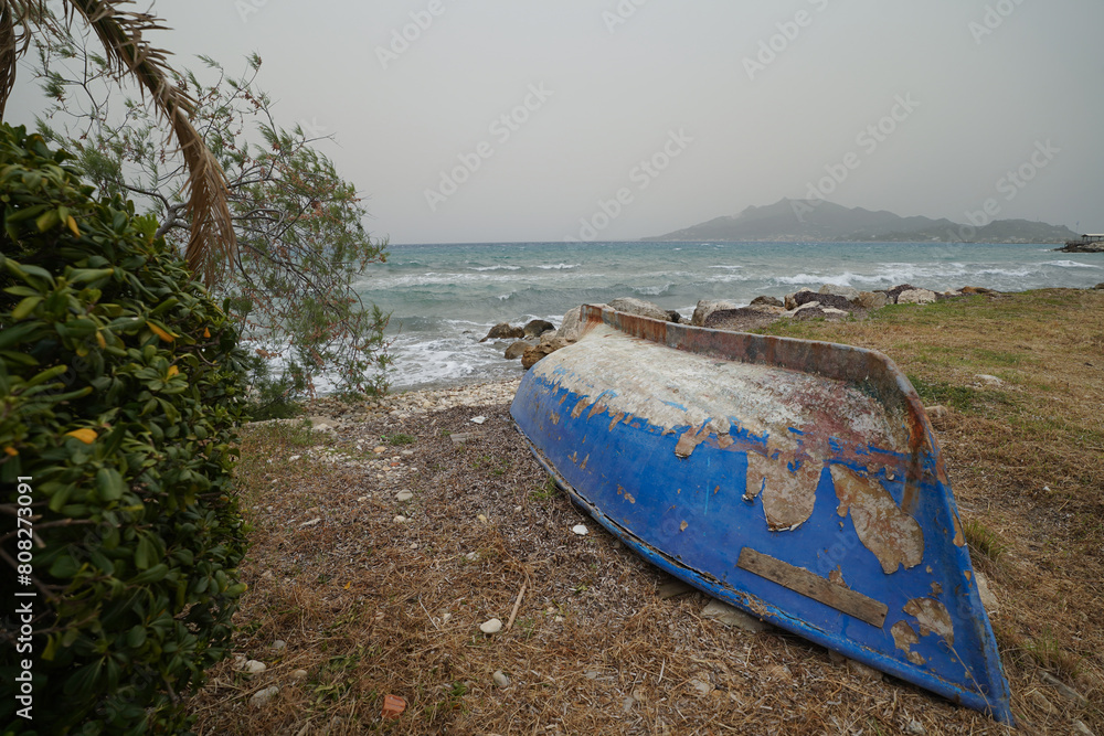 boats on Krioneri beach in Zakynthos on a cloudy day boats on Krioneri beach in Zakynthos on a cloudy day