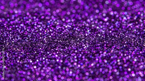   A purple glitter background with multiple sparkles scattered across the top and bottom halves of the image © Nadia
