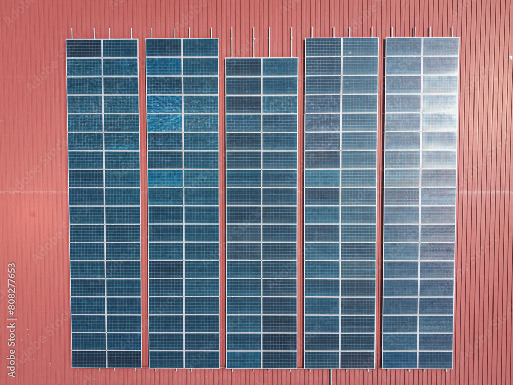 Close-up view of a solar cell panel on the rooftop, emphasizing the concept of clean energy.