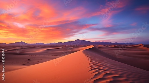 Sunset over sand dunes in Death Valley National Park, California © A