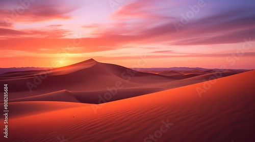 Panoramic view of sand dunes in the desert at sunset