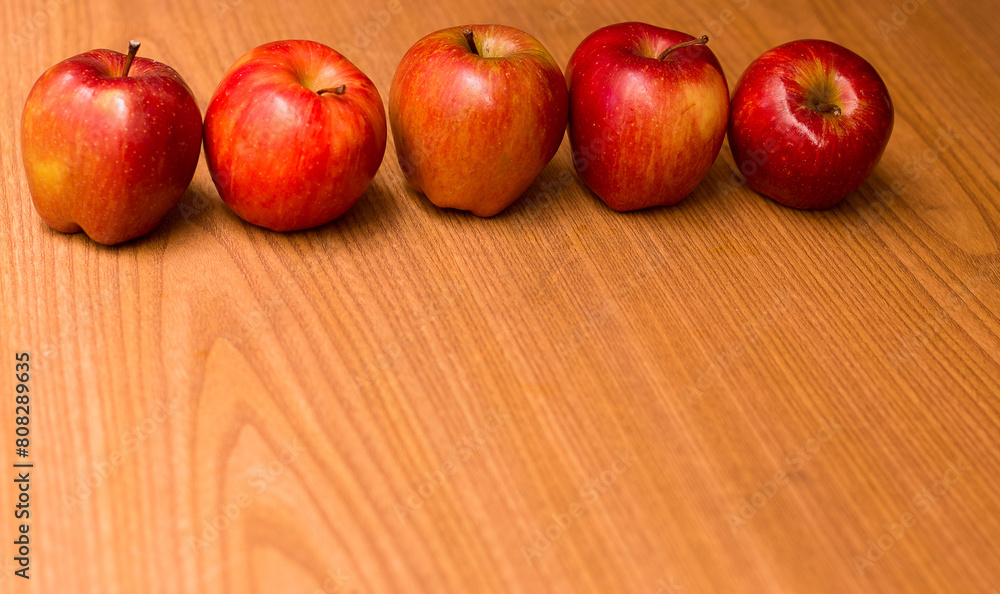 photography of red apples on wooden background photography of red apples on wooden background