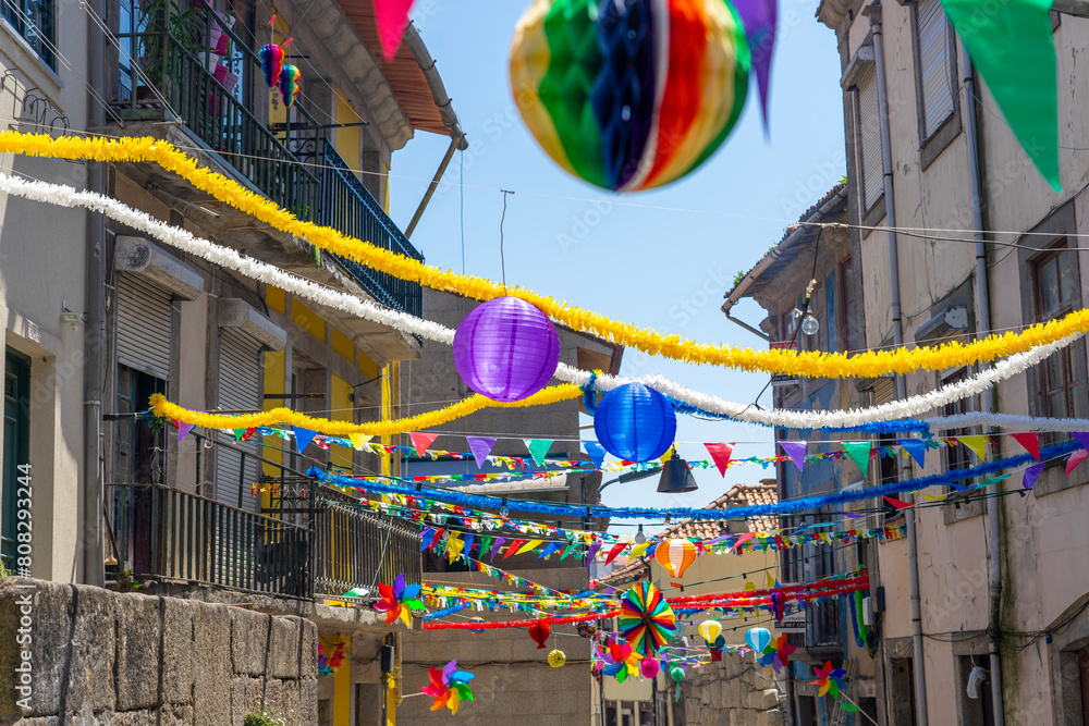 colorful baner decoration in Porto at sao joao festa saint john the baptist festival with residental building background
