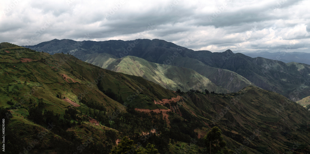 photography of green mountains, field, the sky next to mountains photography of green mountains, field, the sky next to mountains