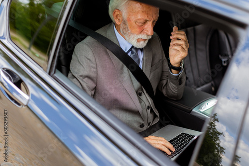 Senior businessman working ...