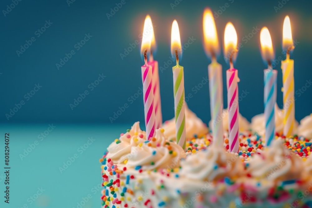Close up of a birthday cake with colorful candles on a blue background Generative AI Close up of a birthday cake with colorful candles on a blue background Generative AI
