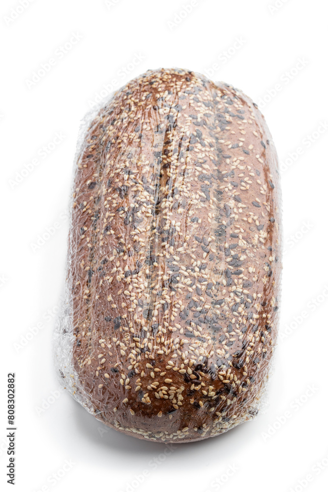 Fototapeta premium Packed whole grain rye bread isolated on white
