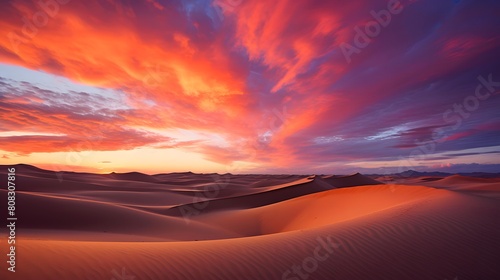 Sunset over the sand dunes in the Sahara desert in Morocco © A