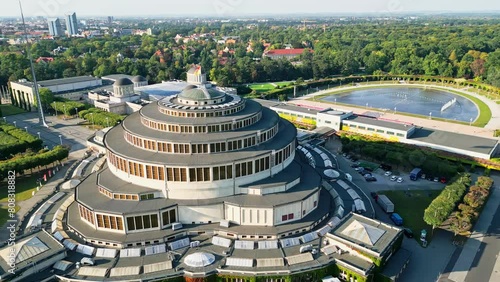 Aerial drone video of the Centennial Hall or Hala Stulecia event venue in Wrocław Poland during an afternoon