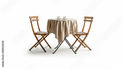 A round table draped with a cloth and accompanied by two chairs is isolated against a white background.