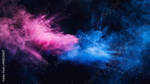 Freeze motion captures blue and pink color powder exploding against a black background.
