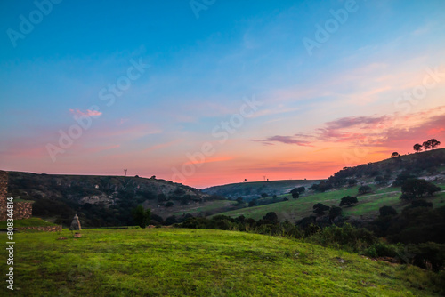 Sunrise in the field with colored sky in arcos del sitio in tepotzotlan state of mexico photo