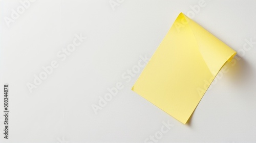 Blank Clean Yellow Sticky Sticker On White Background For Informational Reminder. A piece of paper. Space For Text.