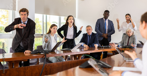Fotografie Multiracial group of age-diverse business people in formalwear having an emotion
