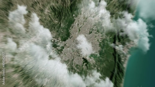 Zooming on Sao Paulo, Brazil. Earth zoom in from outer space to city. The animation continues by zoom out through clouds and atmosphere into space. View of the Earth at night. Images from NASA. 4K